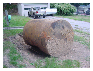 Excavated residential oil tank